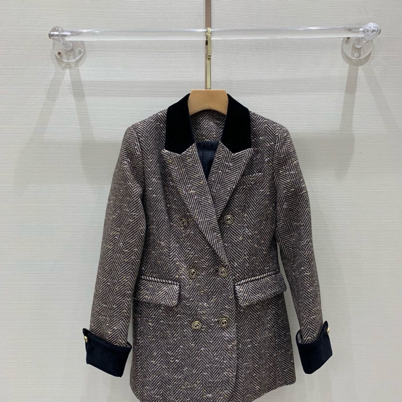 G*u*i coats